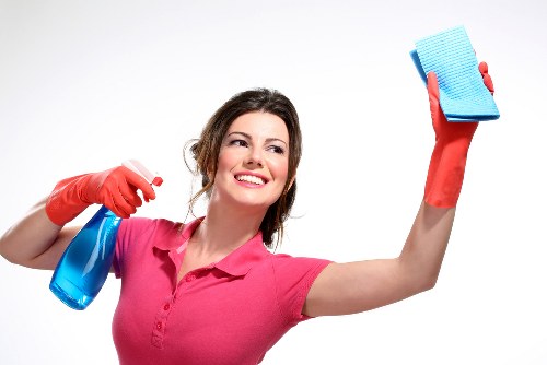Cleaner preparing a mattress for drying after cleaning